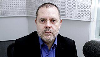 Ушаков объяснил отмену визита Путина в Париж