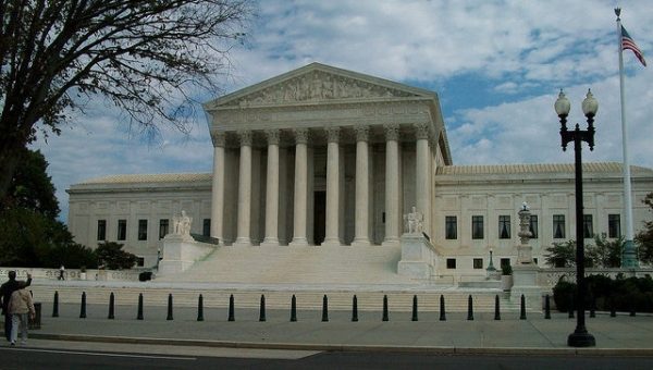 Минюст США не согласился с решением суда о блокировке иммиграционного указа