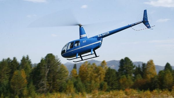 Разбившийся в Латвии вертолет зацепился за провода ЛЭП